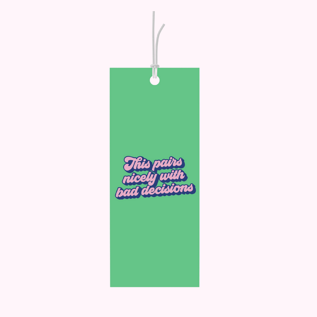Bad on Paper green gift tag that reads "this pairs nicely with bad decisions". Gift tag specification are 5cm x 10cm, printed on premium 400gsm. This tag is a light hearted stab at the accompanying gift being alochol. Last minute gift idea on the go. This gift tag is perfect for bottles of wine and alcohol and wrapped gifts and presents. Made in Australia